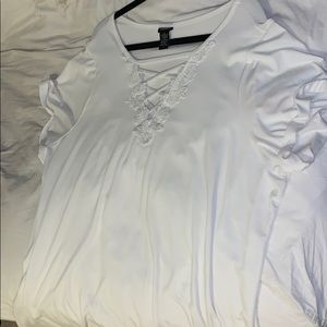 White shirt with lacy detail.